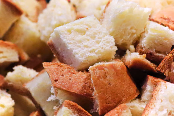 Closeup of bread cut into cubs for stuffing.