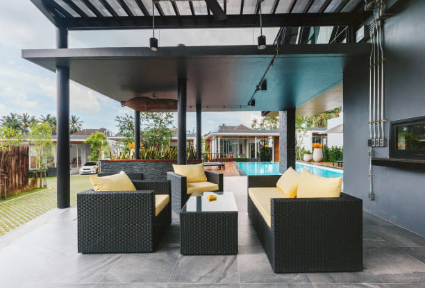 istock Tropical summer luxury villa interior outdoor. Palm trees, sunny day 1207884002