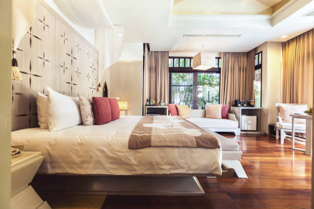 istock Tropical hotel room interior. Big windows, sunny space 1207884095