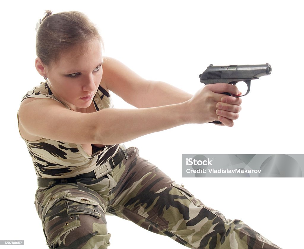 Junge Frau mit einer Pistole - Lizenzfrei Erwachsene Person Stock-Foto