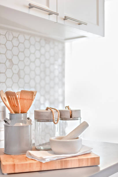 istock Kitchen utensils under the pantry cupboards beside a wall 1207887368