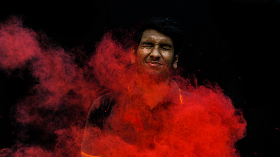 Young man with holi colors. holi is a festival of India. It is festival of colors and Joy. It is also called as Dhuleti.