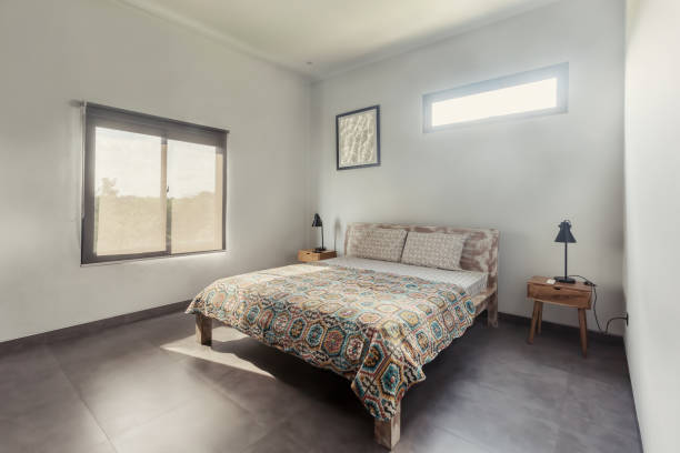 istock Natural bedroom interior, wooden bed, white walls,  minimalism 1207891765
