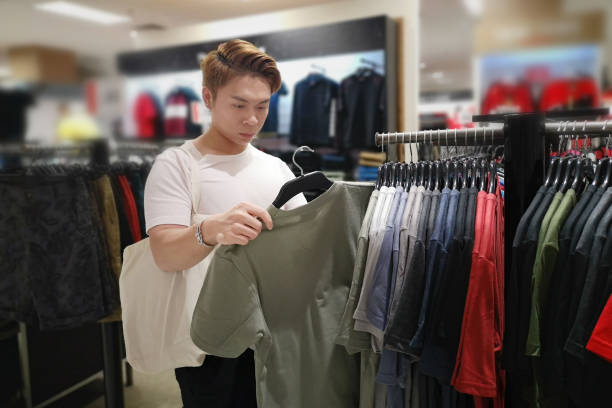istock South East Asia: Asian Man Shopping 1207892855