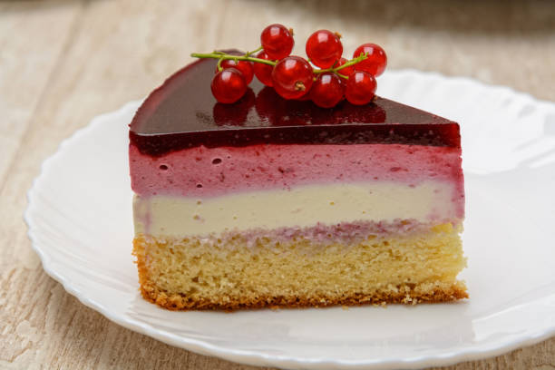 istock A slice of delicious berry cake on the plate. 1207894331
