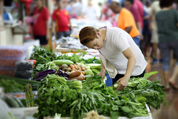 istock Asian Man Shopping 1207901926