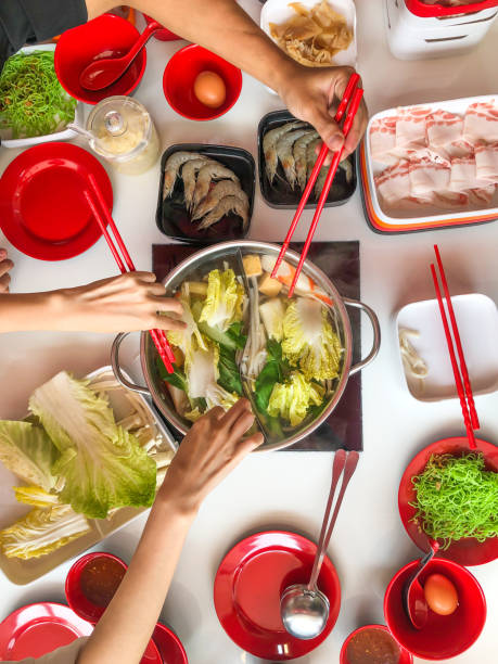 istock Top view meat with vegetable over hot pot. 1207904423