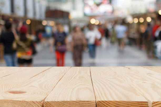 istock wooden table in front of abstract blurred bokeh background 1207908850