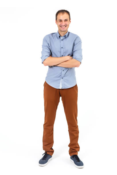istock Handsome young man posing in the Studio. portrait in full growth isolated on a white background 1207911005