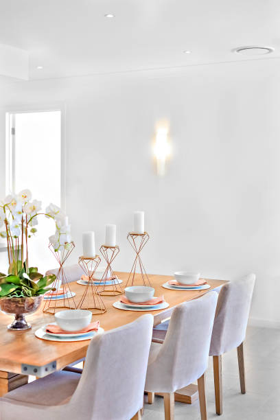 istock Dining area with a wooden table and chairs 1207912321