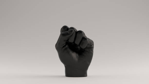 negro criado apretó puño antifascista - black backgound fotografías e imágenes de stock
