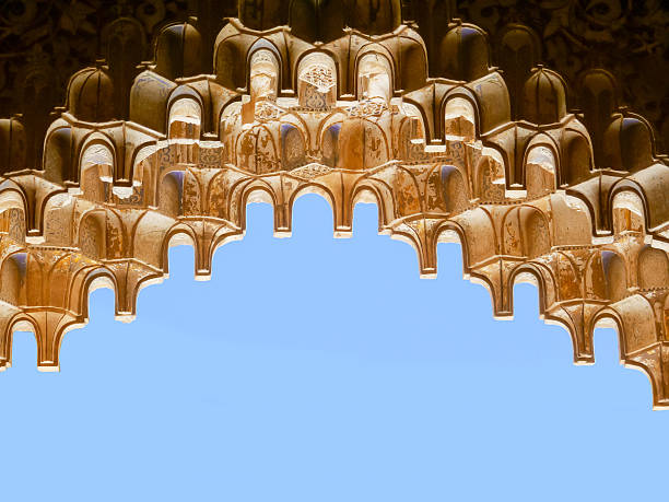 Impressive islamic decorations placed in the very famous palace of Alhambra (Granada). Hanging elements in the form of stalactites are called muqarnas.