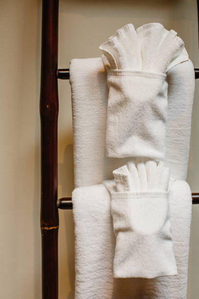 istock White towels hanging on bamboo racking in hotel bathroom 1207917159