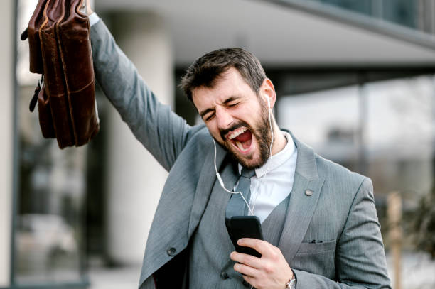 istock Businessman enjoying music 1207918655