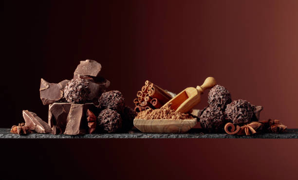 istock Chocolate truffles with broken pieces of chocolate. 1207918770
