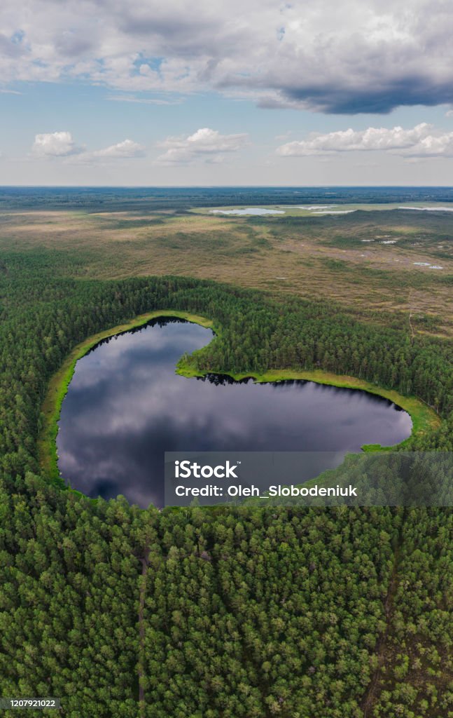 Scenic aerial view of  heart-shaped lake in Finland Scenic aerial view of  heart-shaped lake in Finland in summer Finland Stock Photo