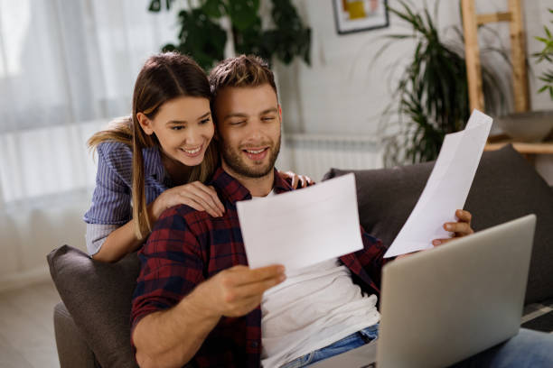 istock Coming up with a plan to maintain their household budget 1207921167