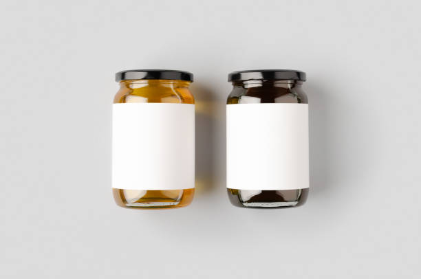 istock Honey jars mockup with blank label. Two different colors. 1207923843