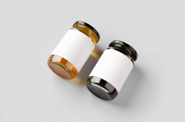 istock Honey jars mockup with blank label. Two different colors. 1207924417