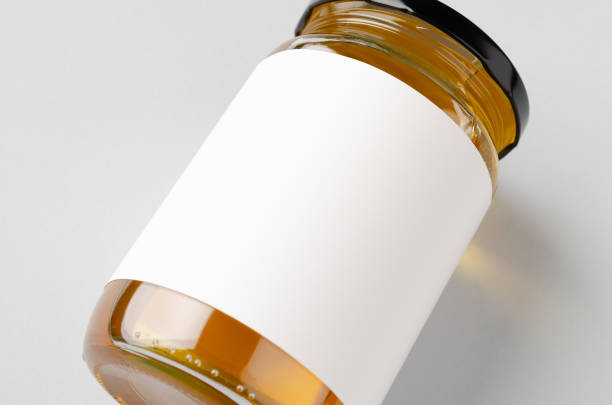 istock Honey jar mockup with blank label. Closeup. 1207924431