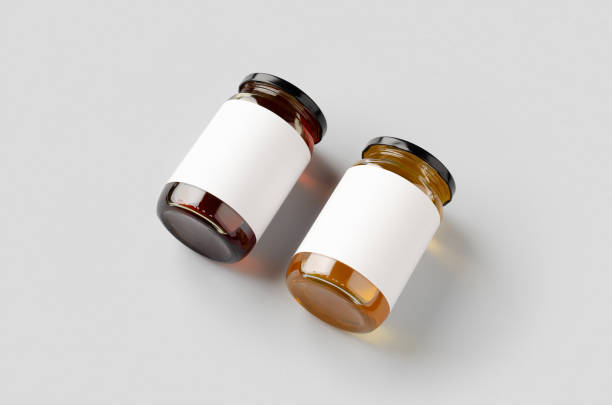 istock Honey jars mockup with blank label. Two different colors. 1207924647