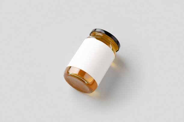 istock Honey jar mockup with blank label. 1207924670