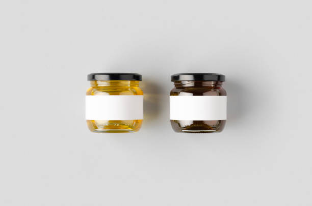 istock Honey jars mockup with blank label. Two different colors. 1207926093