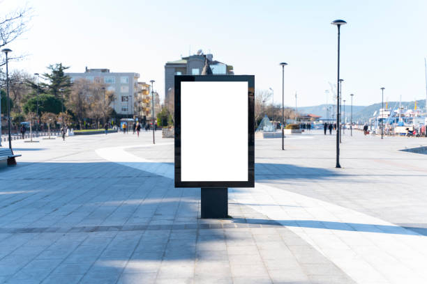 vertical blank billboard on the city street - bus stop imagens e fotografias de stock