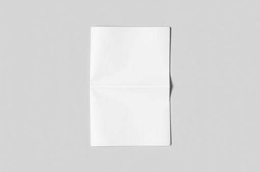 Maqueta de periódico en blanco en un backgound gris. photo