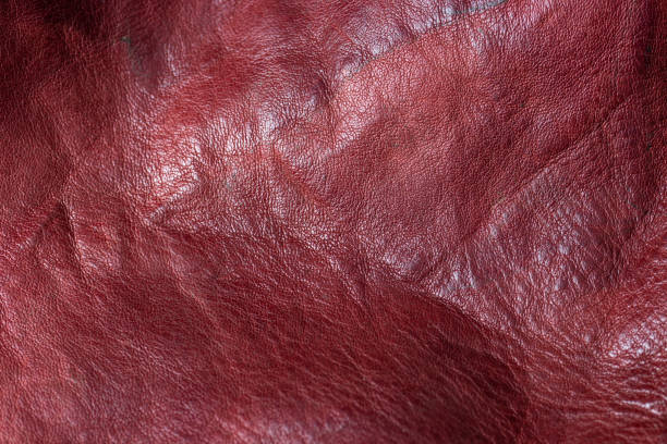 istock luxury natural red leather background closeup 1207928415