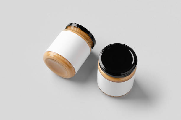 istock Peanut, almond, nut butter jar mockup with blank label. 1207929484