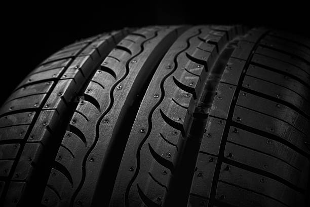 istock Car tire on black background 120793462