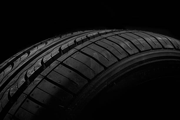 istock Car tire on black background 120793468