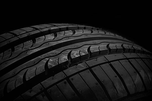 istock Car tire on black background 120793500