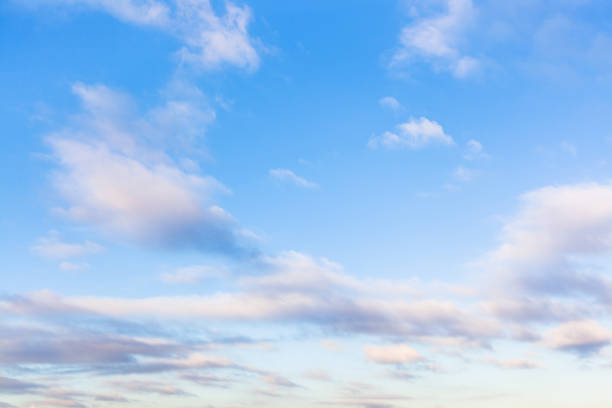 istock low clouds in blue sky in evening twilight 1207935483