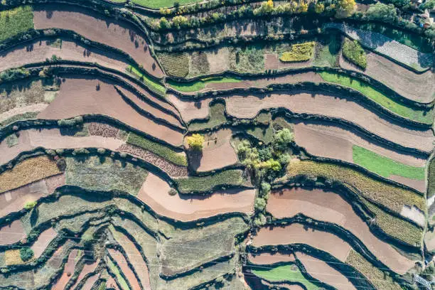 aerial view of  terraced fields and village from above. Qinghai, China