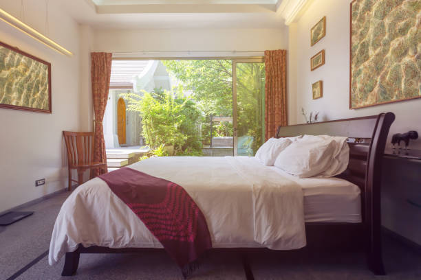 istock Luxury villa bed room interior. Open space, garden terrace 1207938330