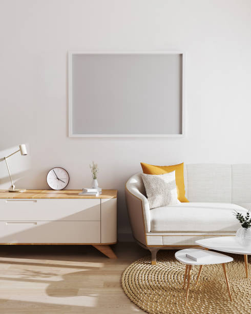 istock Horizontal empty frame above cupboard and sofa on white wall in modern living room interior, 3d rendering. Horizontal picture frame mockup 1207941464