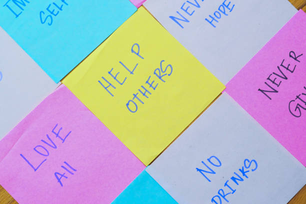 istock new year goals written on notepad, close up 1207943311
