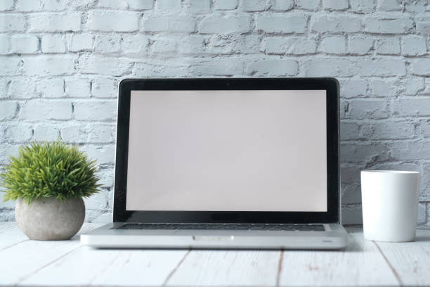 istock laptop, notepad and calculator on office desk 1207943339