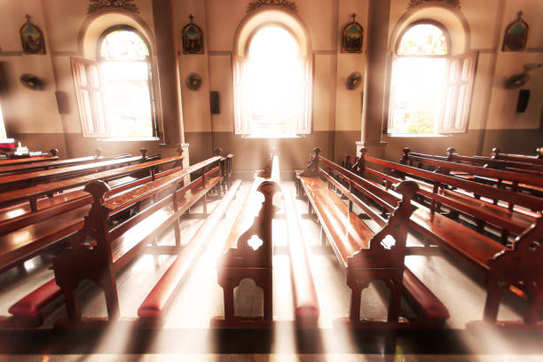 istock Tranquil ancient church interior at sunrise. 1207946801