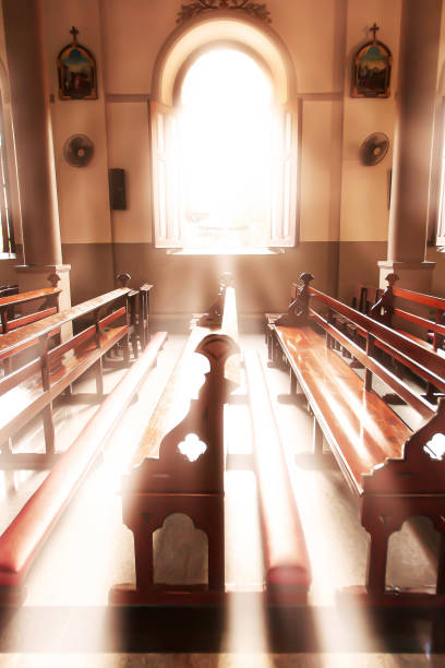 istock Tranquil ancient church interior at sunrise. 1207946890
