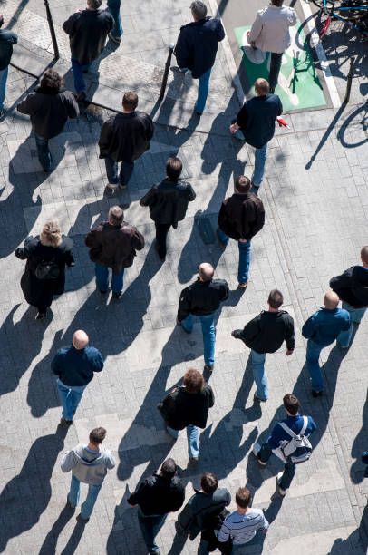 istock Crowd of Pedestrians Walking from Above 1207948565