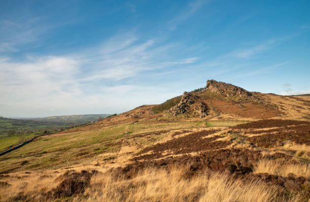 istock Epic Peak District Winter landscape of Ramsaw Rocks viewed from Hen Cloud with beautiful sunset sky 1207948685