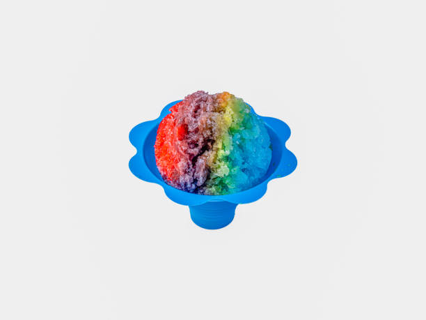 istock Hawaiian shave ice, shaved ice or snow cone against a white background with copy space. 1207949608