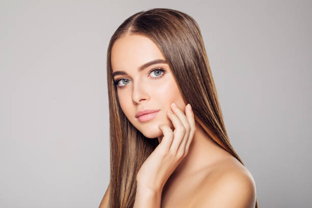 istock Young woman with beautiful brown hairstyle 1207949683