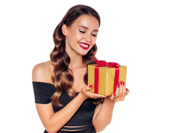 istock Beautiful woman with present 1207951262