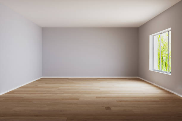 istock Empty room for mockup. Empty room with light wall and wooden floor.3d rendering. 1207953257