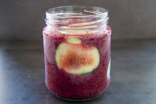 istock Acai superfoods smoothies bowl with fresh fig 1207955605