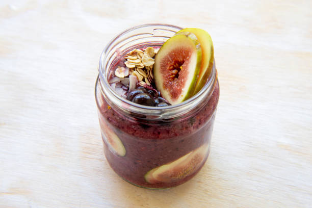 istock Acai superfoods smoothies bowl with fresh fig 1207955634
